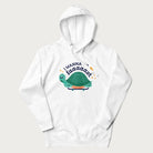 White hoodie with a graphic of a happy turtle on a skateboard and the text 'I Wanna Go Faaaaast'.