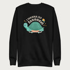 Black sweatshirt with a graphic of a turtle on a skateboard and the phrase 'I Wanna Go Fast.'