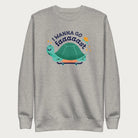 Light grey sweatshirt with a graphic of a turtle on a skateboard and the phrase 'I Wanna Go Fast.'