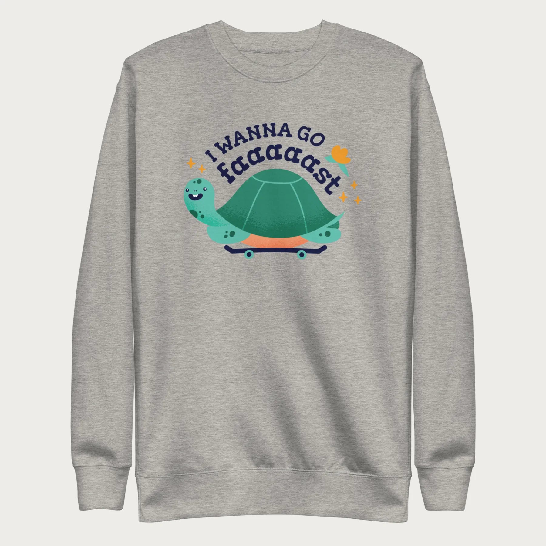 Light grey sweatshirt with a graphic of a turtle on a skateboard and the phrase 'I Wanna Go Fast.'