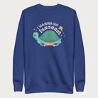 Royal blue sweatshirt with a graphic of a turtle on a skateboard and the phrase 'I Wanna Go Fast.'