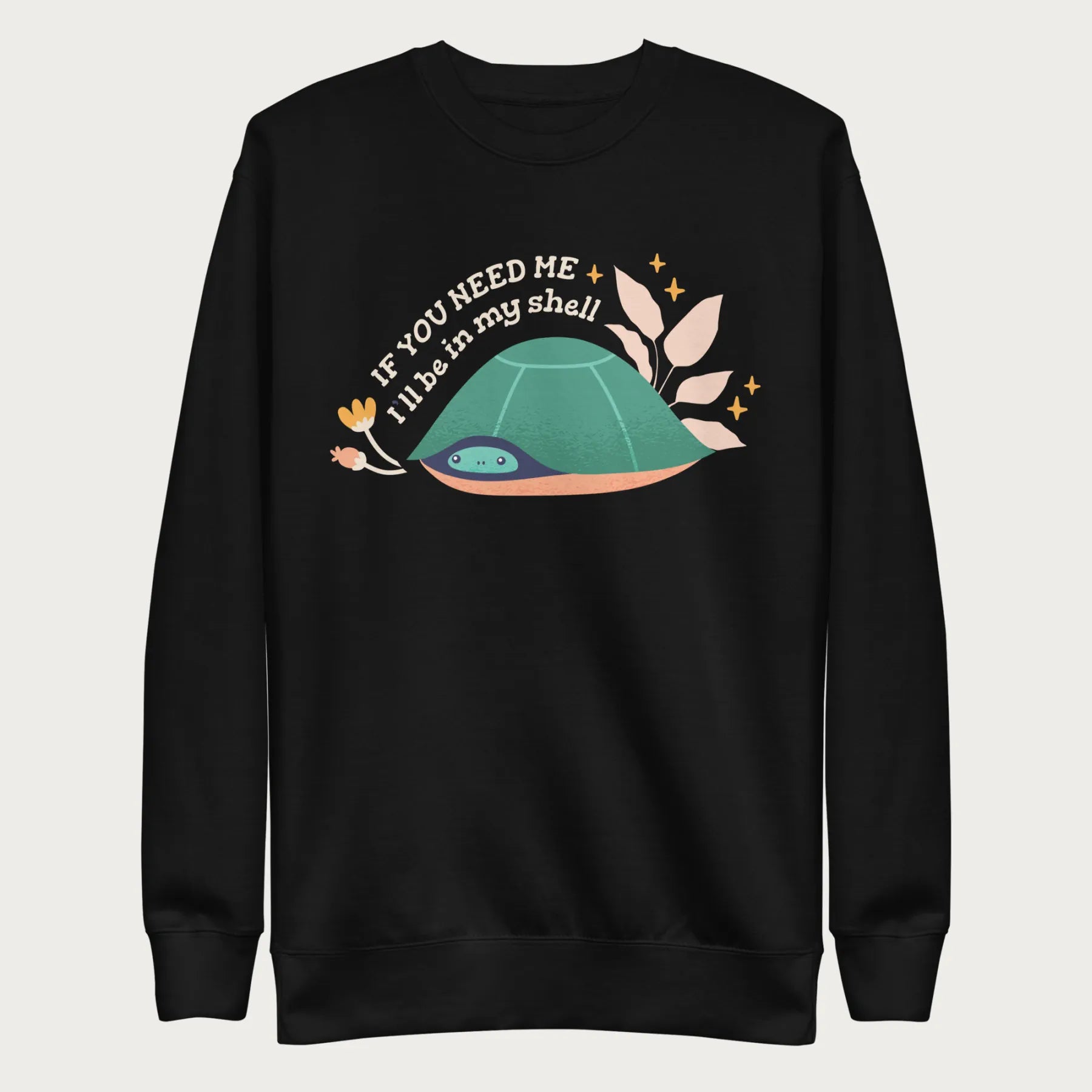 Black sweatshirt with a graphic of a turtle hiding in its shell and the phrase 'If You Need Me, I'll Be in My Shell.'