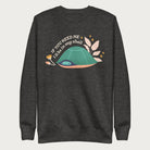 Dark grey sweatshirt with a graphic of a turtle hiding in its shell and the phrase 'If You Need Me, I'll Be in My Shell.'