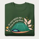 Folded forest green sweatshirt with a graphic of a turtle hiding in its shell and the phrase 'If You Need Me, I'll Be in My Shell.'