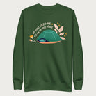 Forest green sweatshirt with a graphic of a turtle hiding in its shell and the phrase 'If You Need Me, I'll Be in My Shell.'