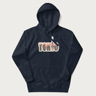 Navy blue hoodie with graphic of Tokyo's skyline integrated into the word 'TOKYO' in sunset colors.