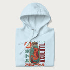 Folded light blue hoodie with Japanese graphic of a red axolotl in a bottle with Japanese text 'ボトル' (Bottle) and 'アホロートル' (Axolotl).