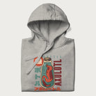 Folded light grey hoodie with Japanese graphic of a red axolotl in a bottle with Japanese text 'ボトル' (Bottle) and 'アホロートル' (Axolotl).