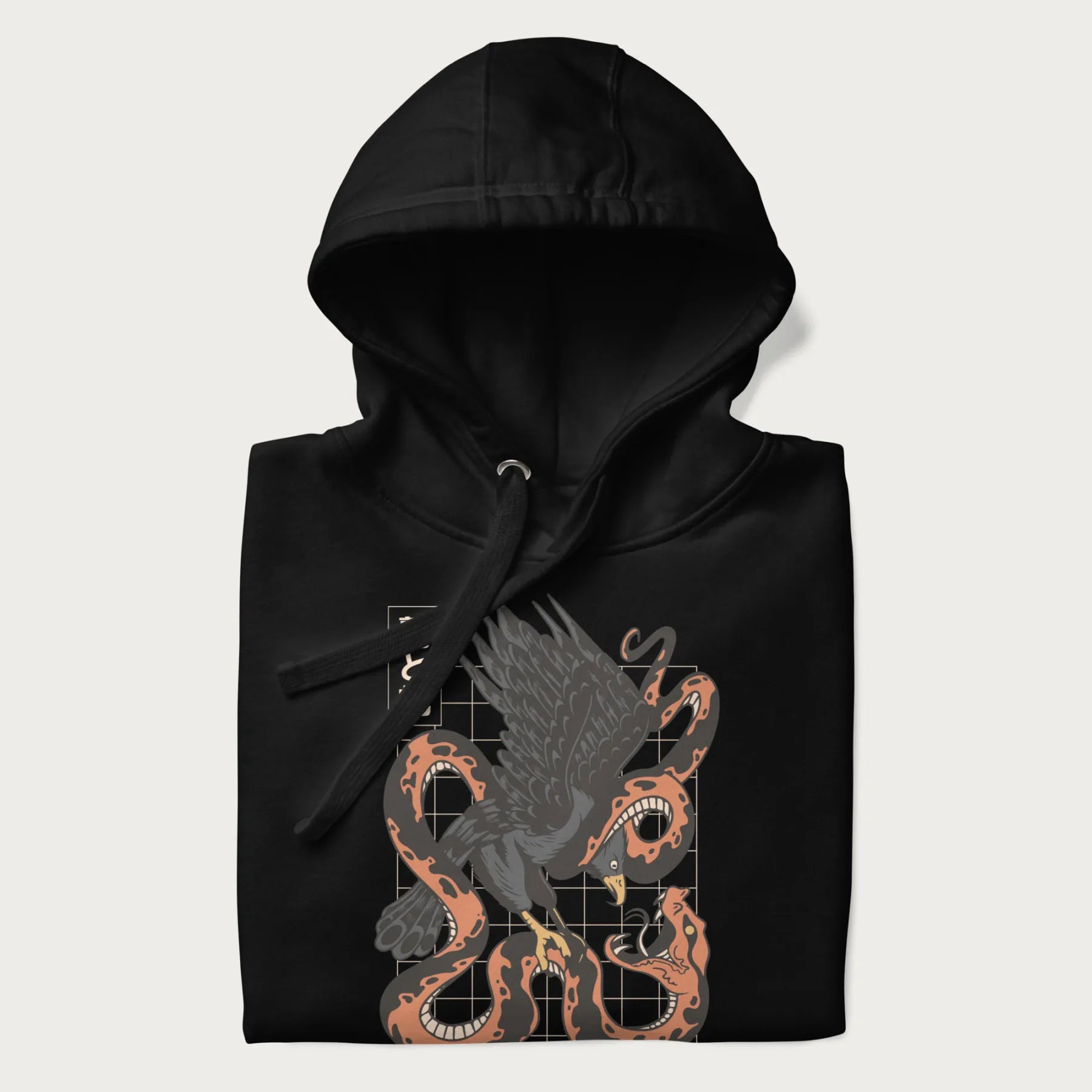 Folded black hoodie with Japanese text and a graphic of an eagle battling a snake, with the text 'Tokyo Japan' underneath.