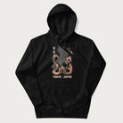 Black hoodie with Japanese text and a graphic of an eagle battling a snake, with the text 'Tokyo Japan' underneath.