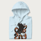 Folded light blue hoodie with Japanese text and a graphic of an eagle battling a snake, with the text 'Tokyo Japan' underneath.