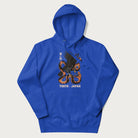 Royal blue hoodie with Japanese text and a graphic of an eagle battling a snake, with the text 'Tokyo Japan' underneath.