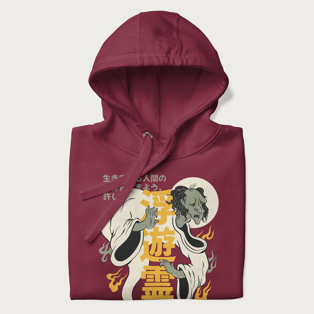 Nearly folded Japanese Hoodie in a maroon colorway with a graphic of a Yurei and kanji characters.