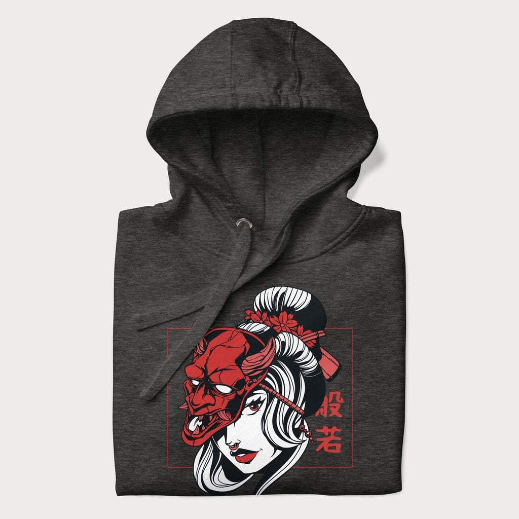 Neatly folded Japanese hoodie in a charcoal heather colorway with a graphic of a geisha wearing a hannya mask.