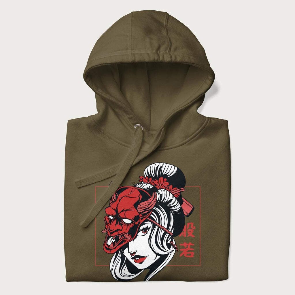 Neatly folded Japanese hoodie in a military green colorway with a graphic of a geisha wearing a hannya mask.