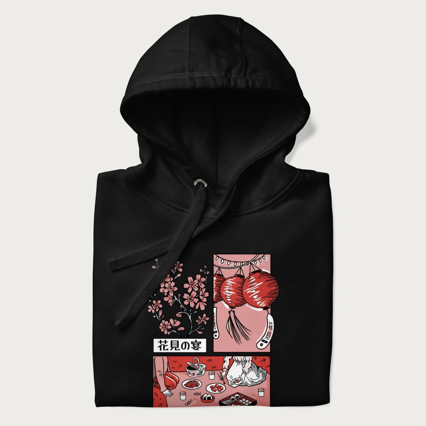 Folded black hoodie with a Japanese cherry blossom festival design.