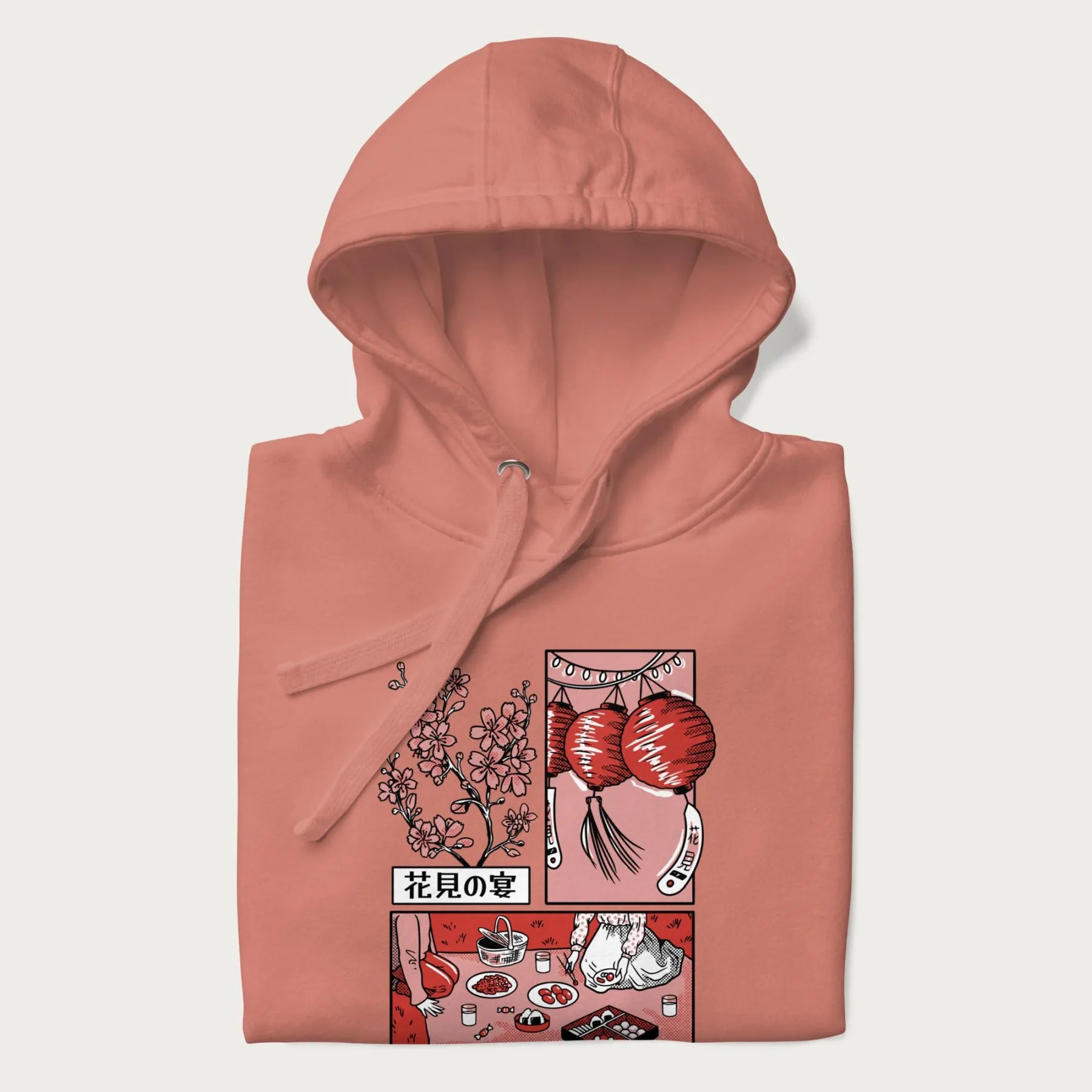 Folded light pink hoodie with a Japanese cherry blossom festival design.