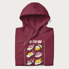 Folded maroon hoodie with a cute Japanese Sushi Cat design.