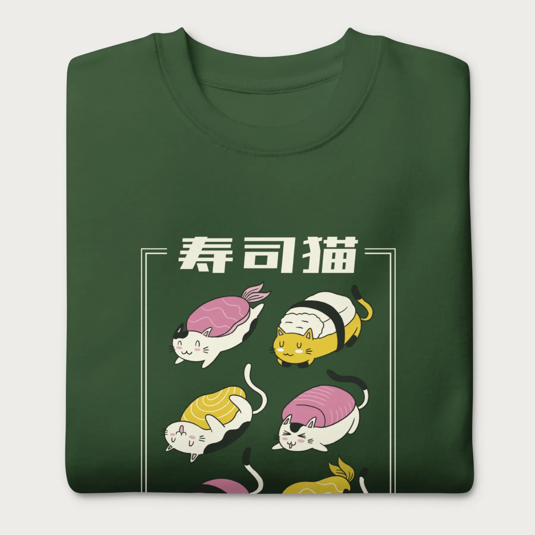 Folded forest green sweatshirt with Japanese text and graphic of cats disguised as sushi.