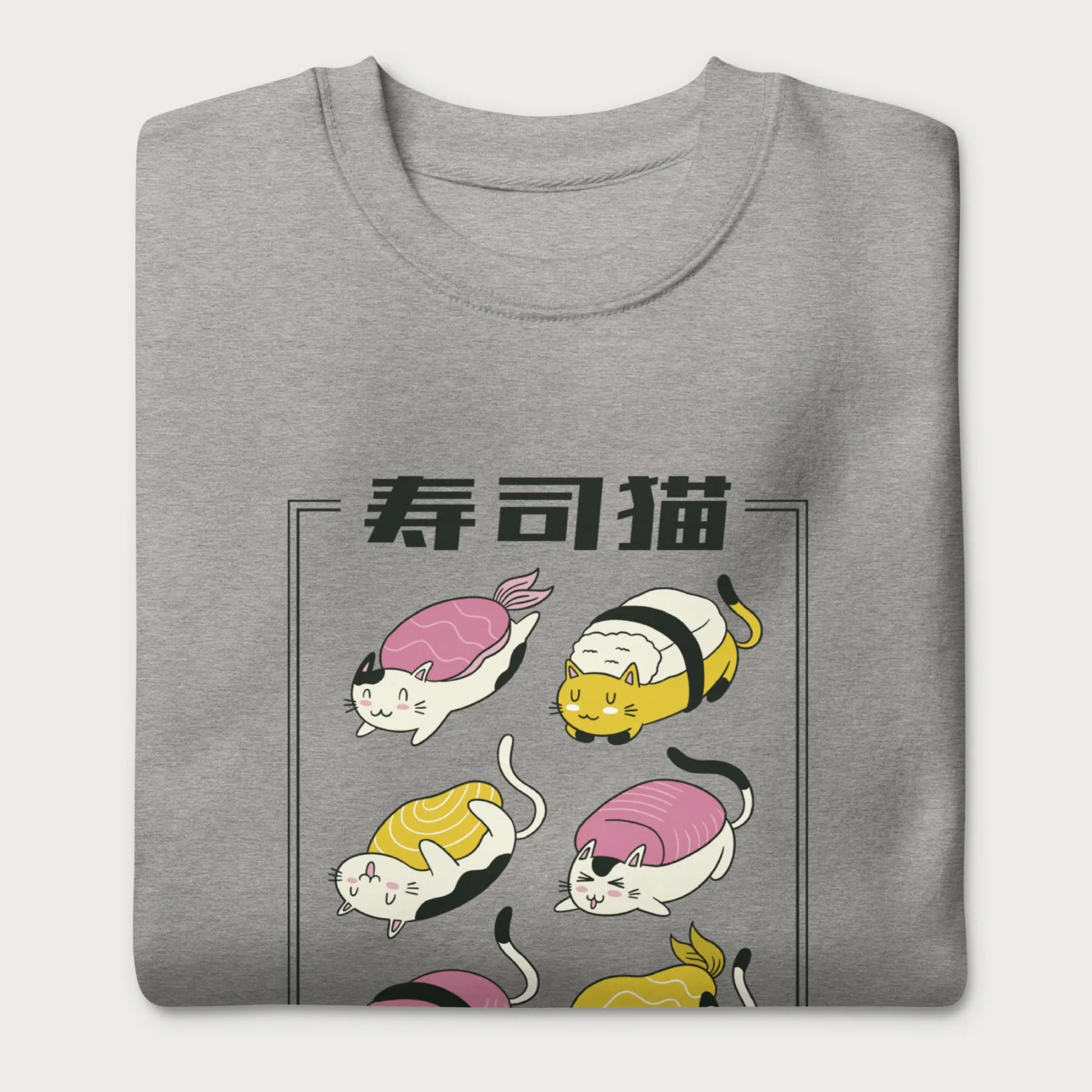 Folded light grey sweatshirt with Japanese text and graphic of cats disguised as sushi.