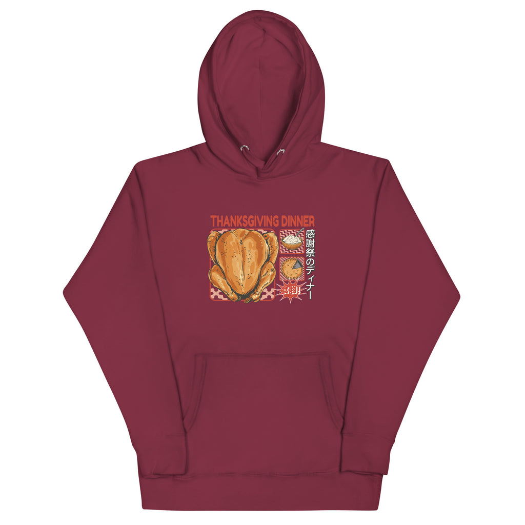 Front of Japanese Thanksgiving Hoodie in Maroon: The front view of a maroon hoodie showcasing a beautifully illustrated Japanese Thanksgiving graphic, complete with a roast chicken, Japanese potato salad, and an apple pie.