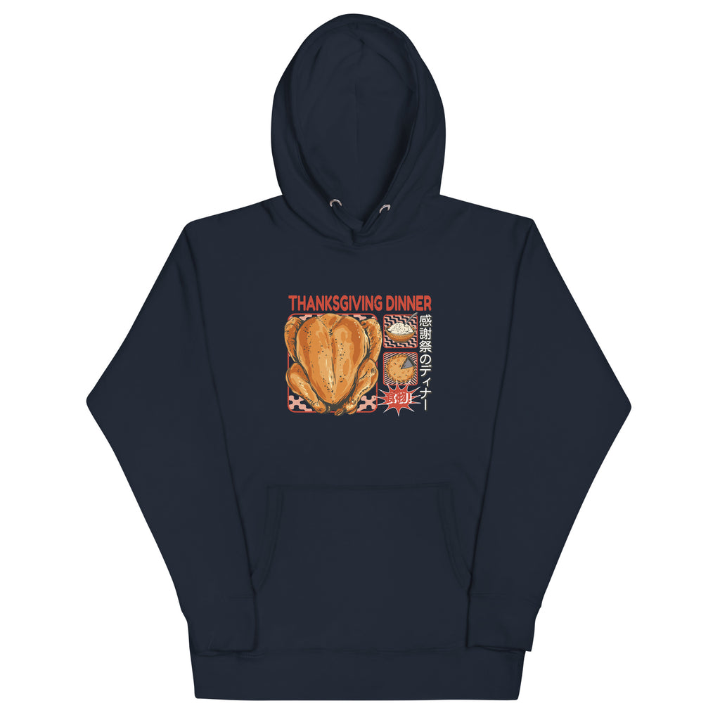 Front of Japanese Thanksgiving Hoodie in Navy Blazer: The front of a navy blue hoodie featuring a detailed Japanese Thanksgiving design with a roast chicken, Japanese potato salad, and an apple pie.