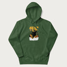Forest green hoodie with graphic of a 'Kaiju Cat' with helicopters and flames in a burning city.