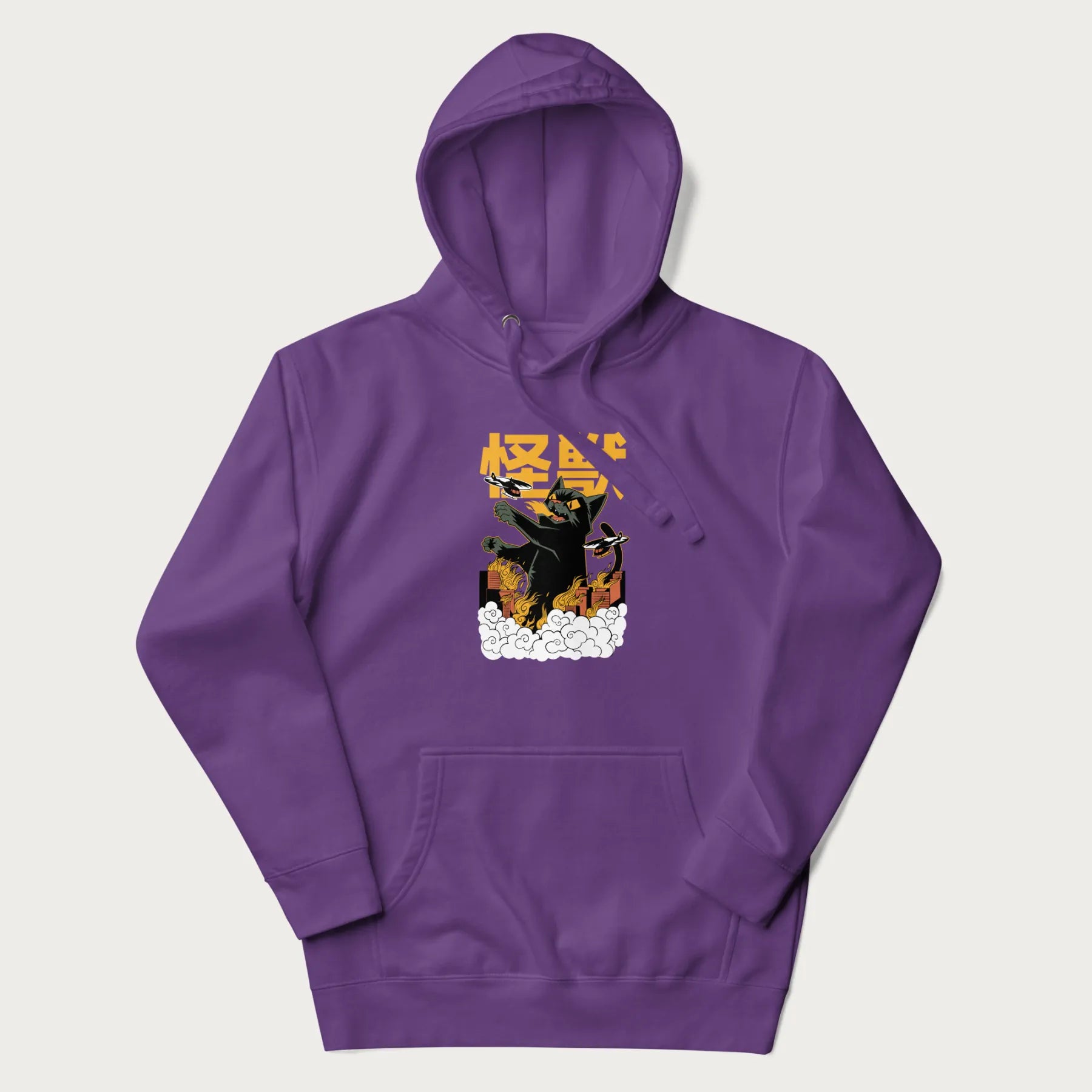 Purple hoodie with graphic of a 'Kaiju Cat' with helicopters and flames in a burning city.