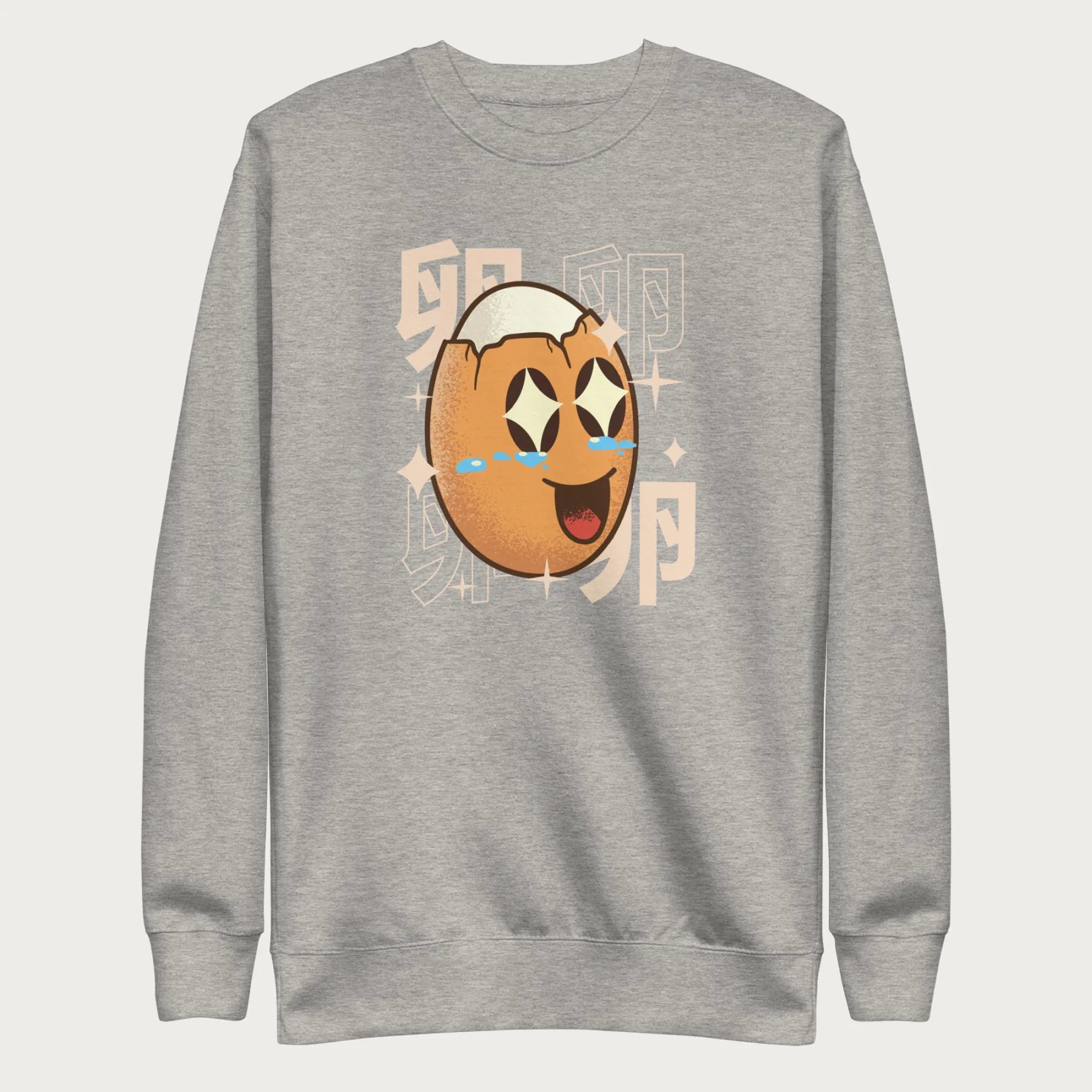 Light grey sweatshirt with Japanese text and a kawaii boiled egg graphic with sparkling eyes..