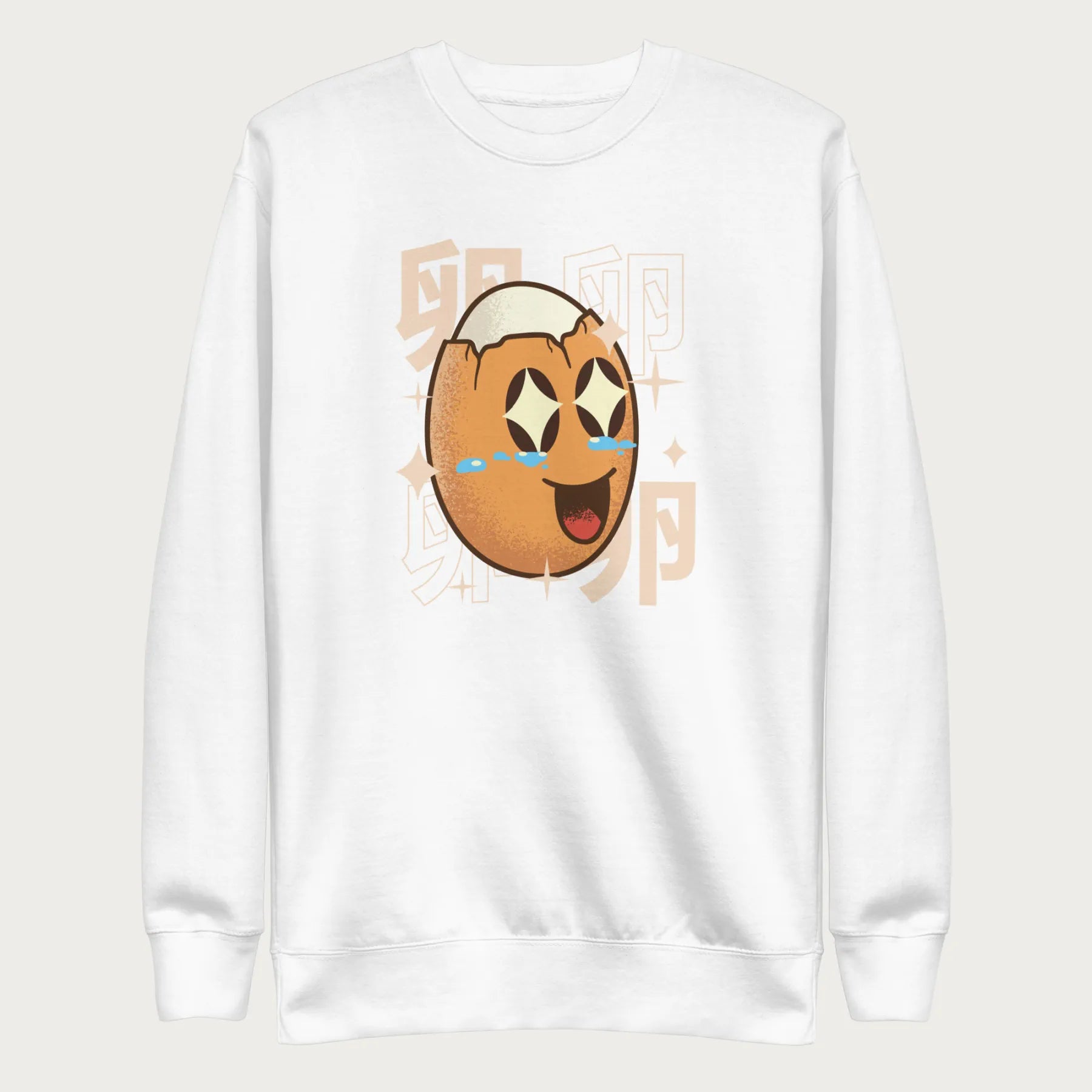 White sweatshirt with Japanese text and a kawaii boiled egg graphic with sparkling eyes..