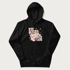 Black hoodie with Japanese graphic of a cat eating ramen with Japanese text '猫' in the background.