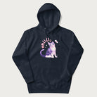 Navy blue hoodie with a graphic of a blue-eyed kitten and Japanese kawaii-style lettering, stars, and a heart.