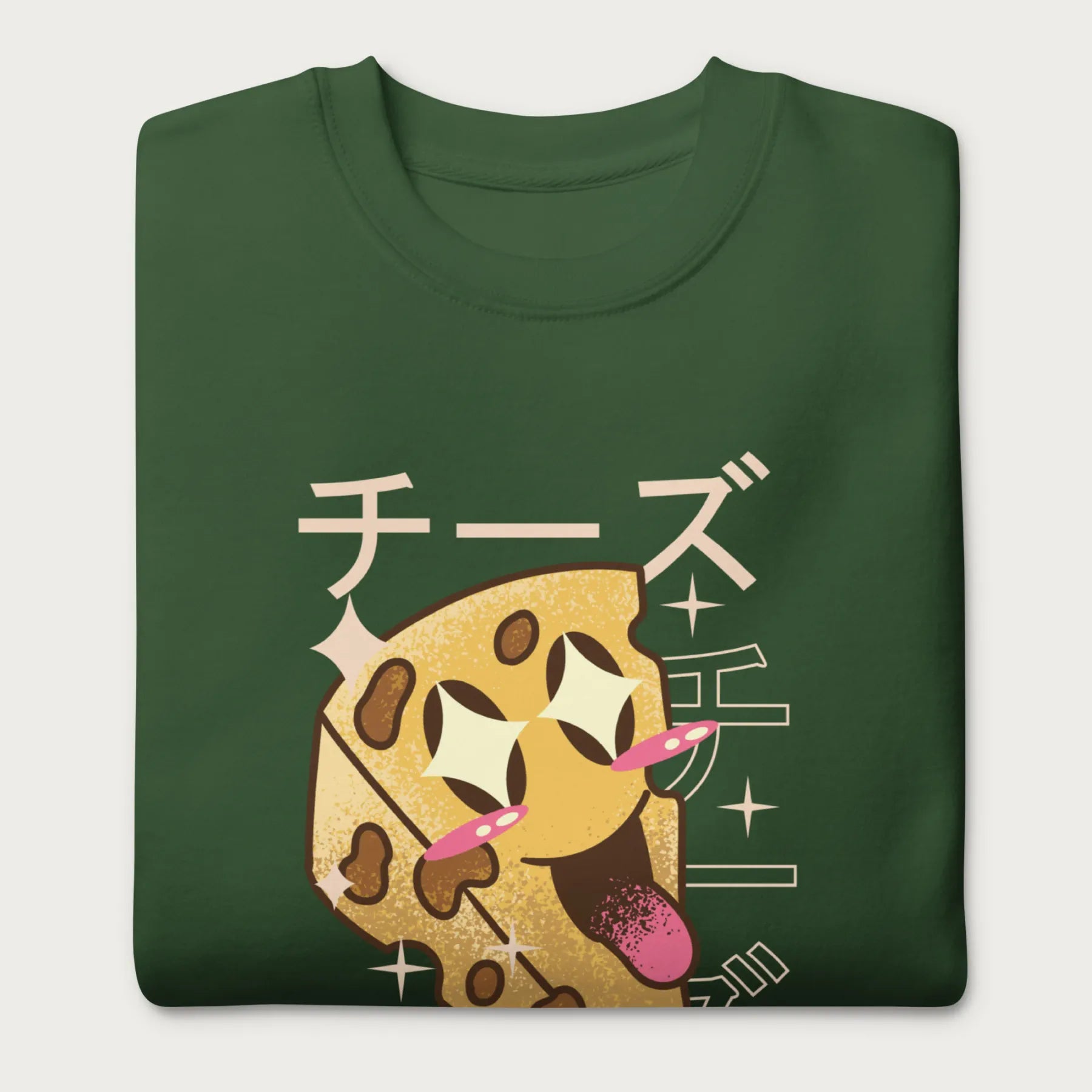 Folded forest green sweatshirt with Japanese text and a kawaii cheese wedge graphic.