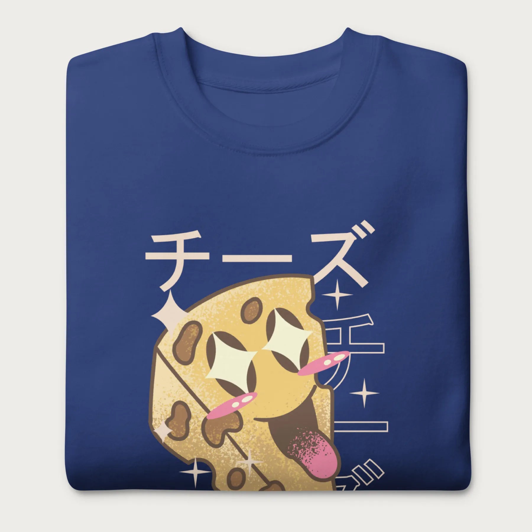 Folded royal blue sweatshirt with Japanese text and a kawaii cheese wedge graphic.