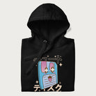 Folded black hoodie with Japanese graphic of a cute sky-blue floppy disk with Japanese text 'キュート' (Cute) and 'ティスク' (Disk).