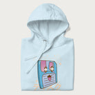 Folded light blue hoodie with Japanese graphic of a cute sky-blue floppy disk with Japanese text 'キュート' (Cute) and 'ティスク' (Disk).