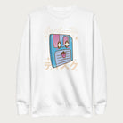 White sweatshirt with a kawaii floppy disk graphic in vibrant colors and Japanese text.