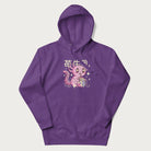 Purple hoodie with Japanese graphic of a cute pink axolotl sipping strawberry milk from a carton, with Japanese text '苺牛乳' (Strawberry Milk).
