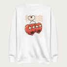 White sweatshirt with Japanese text and a kawaii red apple graphic.