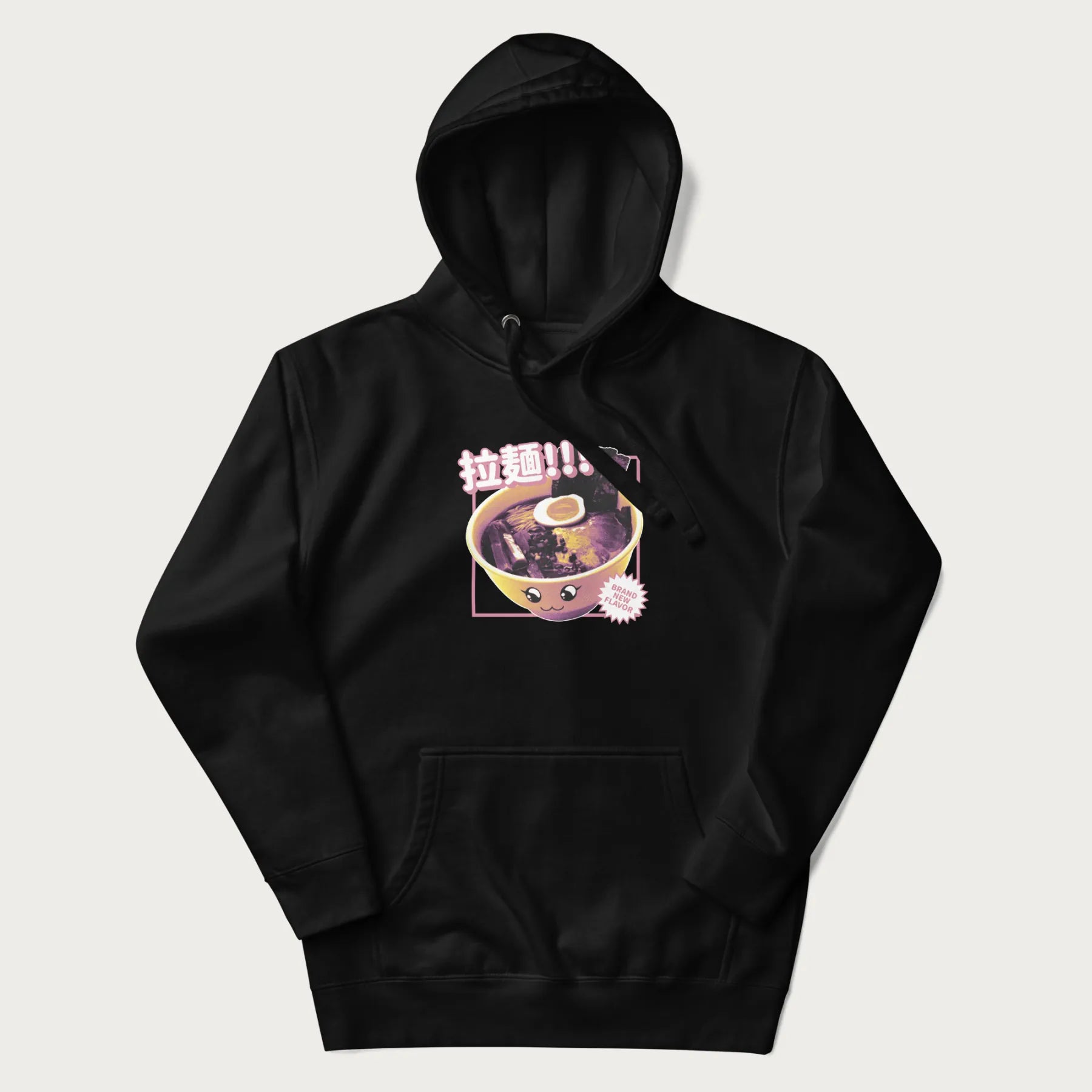 Black hoodie with Japanese text '拉麵!!!' (Ramen!!!) in vibrant pink and realistic ramen bowl graphic.