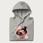 Folded light grey hoodie with Japanese text '拉麵!!!' (Ramen!!!) in vibrant pink and realistic ramen bowl graphic.