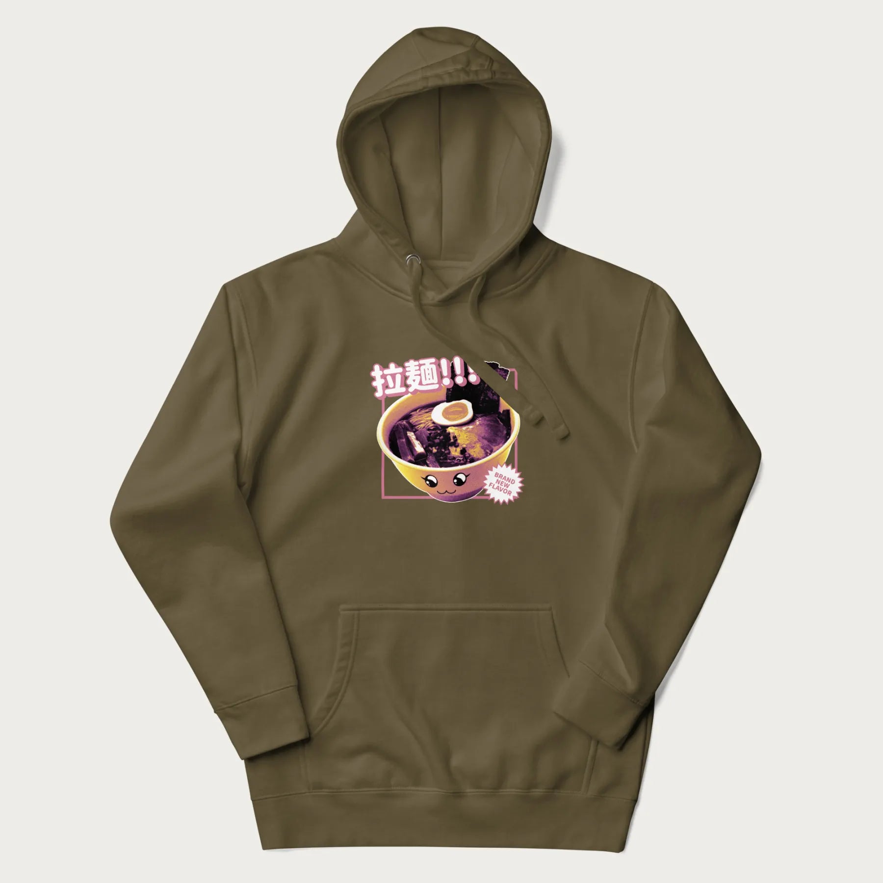 Military green hoodie with Japanese text '拉麵!!!' (Ramen!!!) in vibrant pink and realistic ramen bowl graphic.