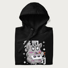 Folded black hoodie with Japanese graphic of a cute grey cat eating sushi, with the Japanese text '寿司' (Sushi) in the background.