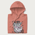 Folded light pink hoodie with Japanese graphic of a cute grey cat eating sushi, with the Japanese text '寿司' (Sushi) in the background.