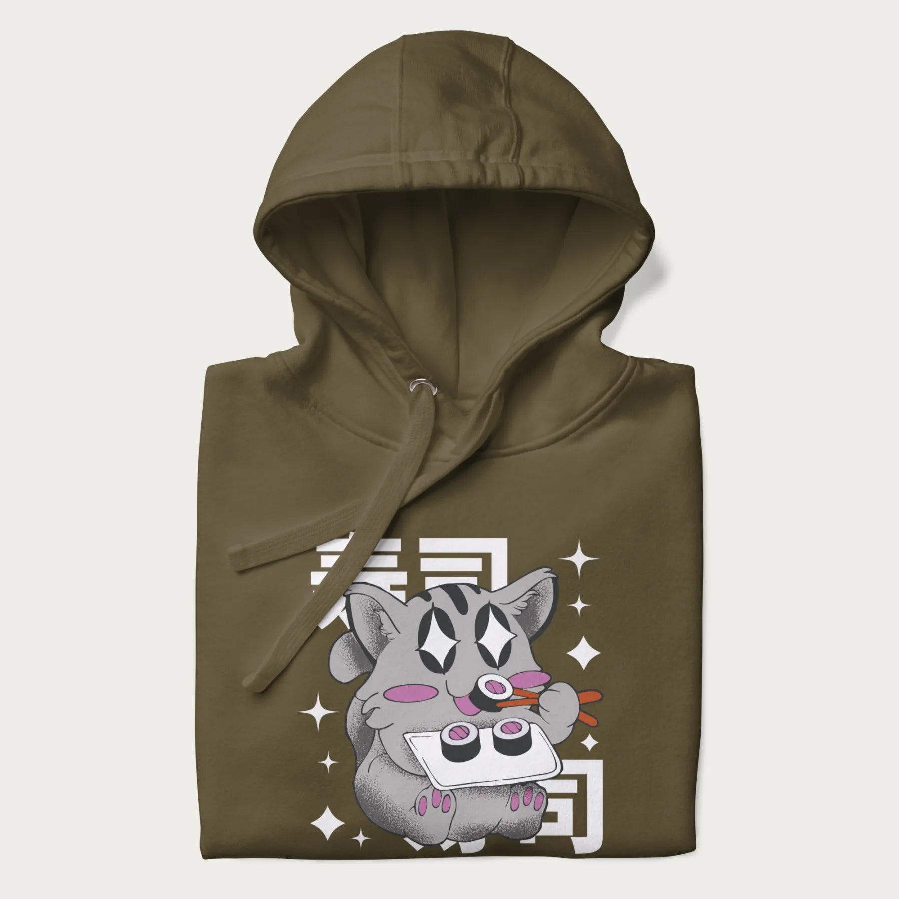 Folded military green hoodie with Japanese graphic of a cute grey cat eating sushi, with the Japanese text '寿司' (Sushi) in the background.