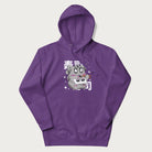 Purple hoodie with Japanese graphic of a cute grey cat eating sushi, with the Japanese text '寿司' (Sushi) in the background.