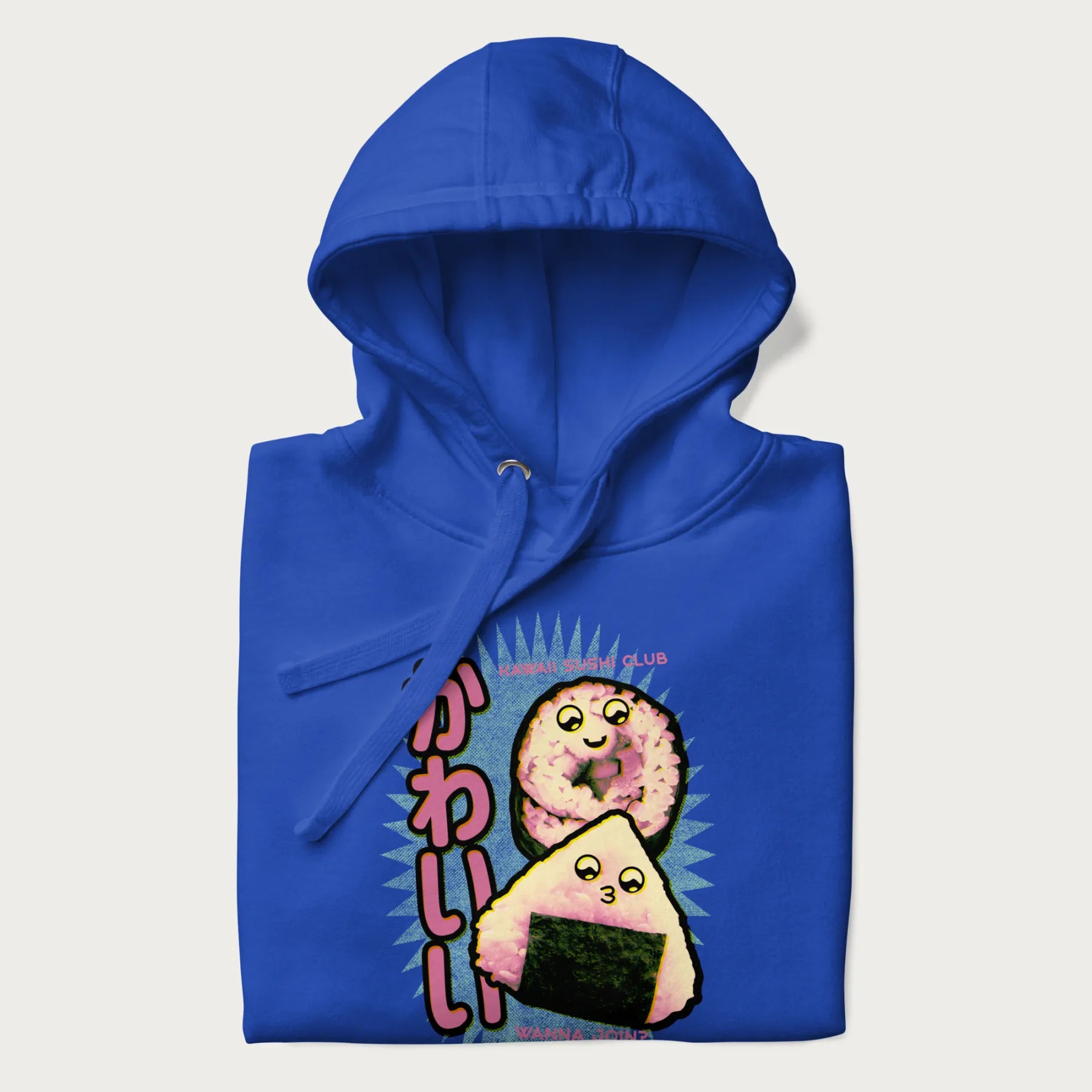 Folded royal blue hoodie featuring a cute sushi and onigiri graphic with the text "Kawaii Sushi Club", colorful neon accents and Japanese characters.