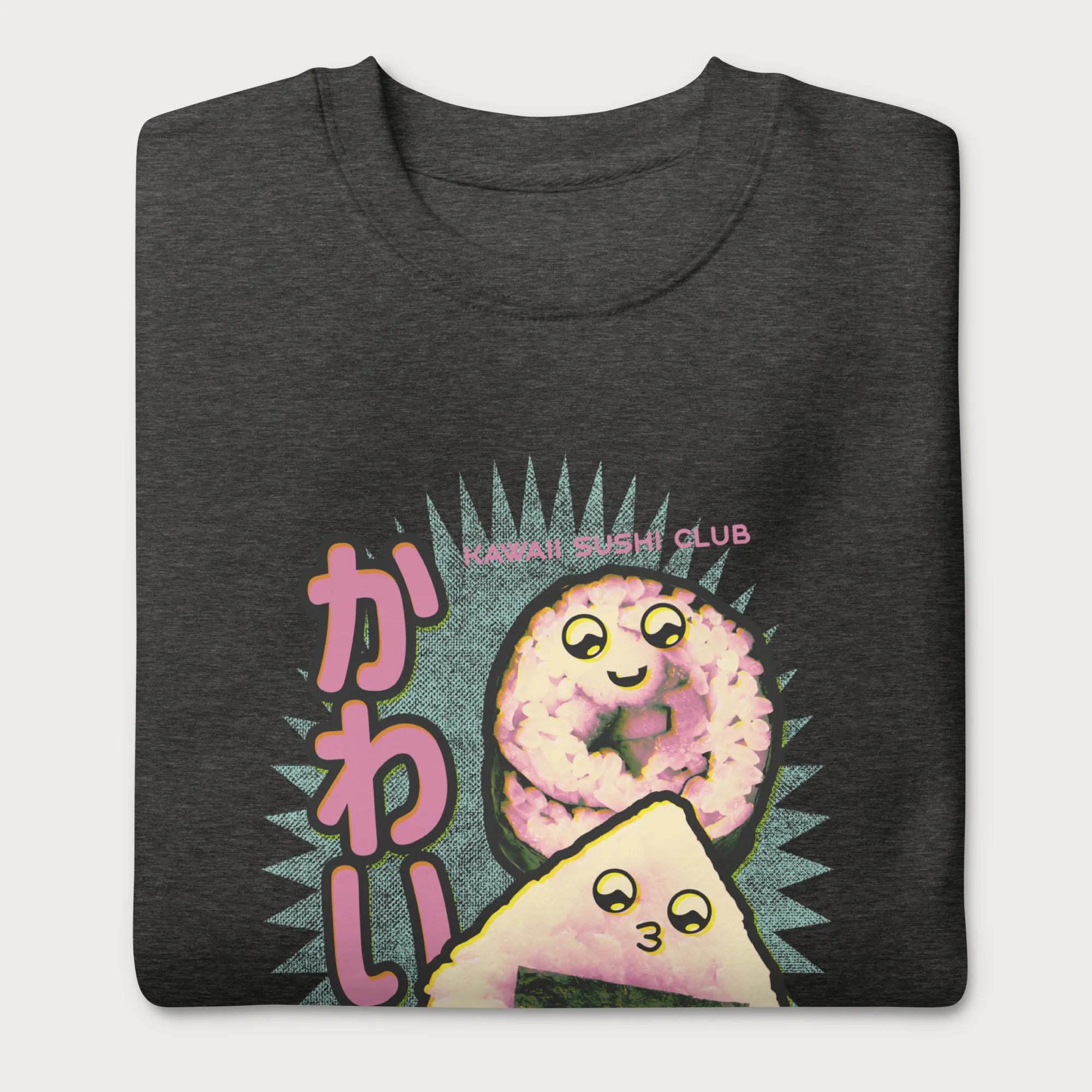 Folded dark grey sweatshirt with a cute graphic of a sushi roll and onigiri, featuring the Japanese text 'Kawaii.'