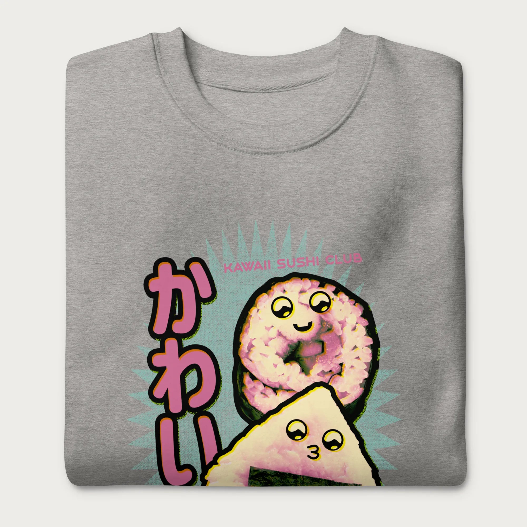 Folded light grey sweatshirt with a cute graphic of a sushi roll and onigiri, featuring the Japanese text 'Kawaii.'