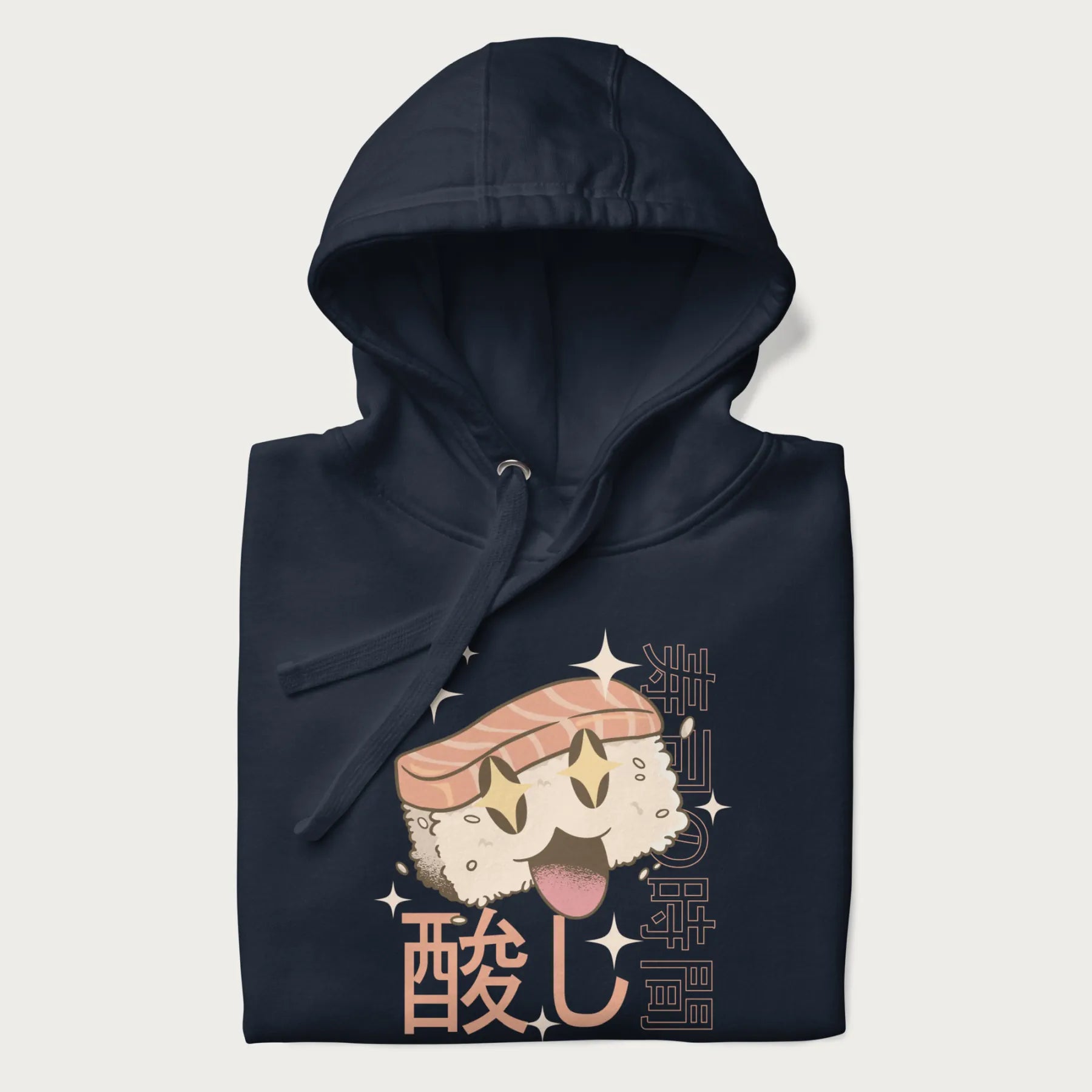 Folded navy blue hoodie with Japanese graphic of a cute sushi with sparkling eyes accompanied by Japanese text '寿司の時間' (Sushi Time).